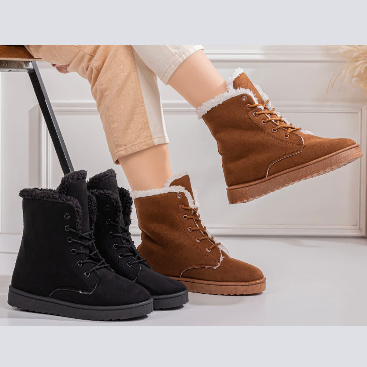 أحذية الكاحل المبطنة بالفرو للنساء